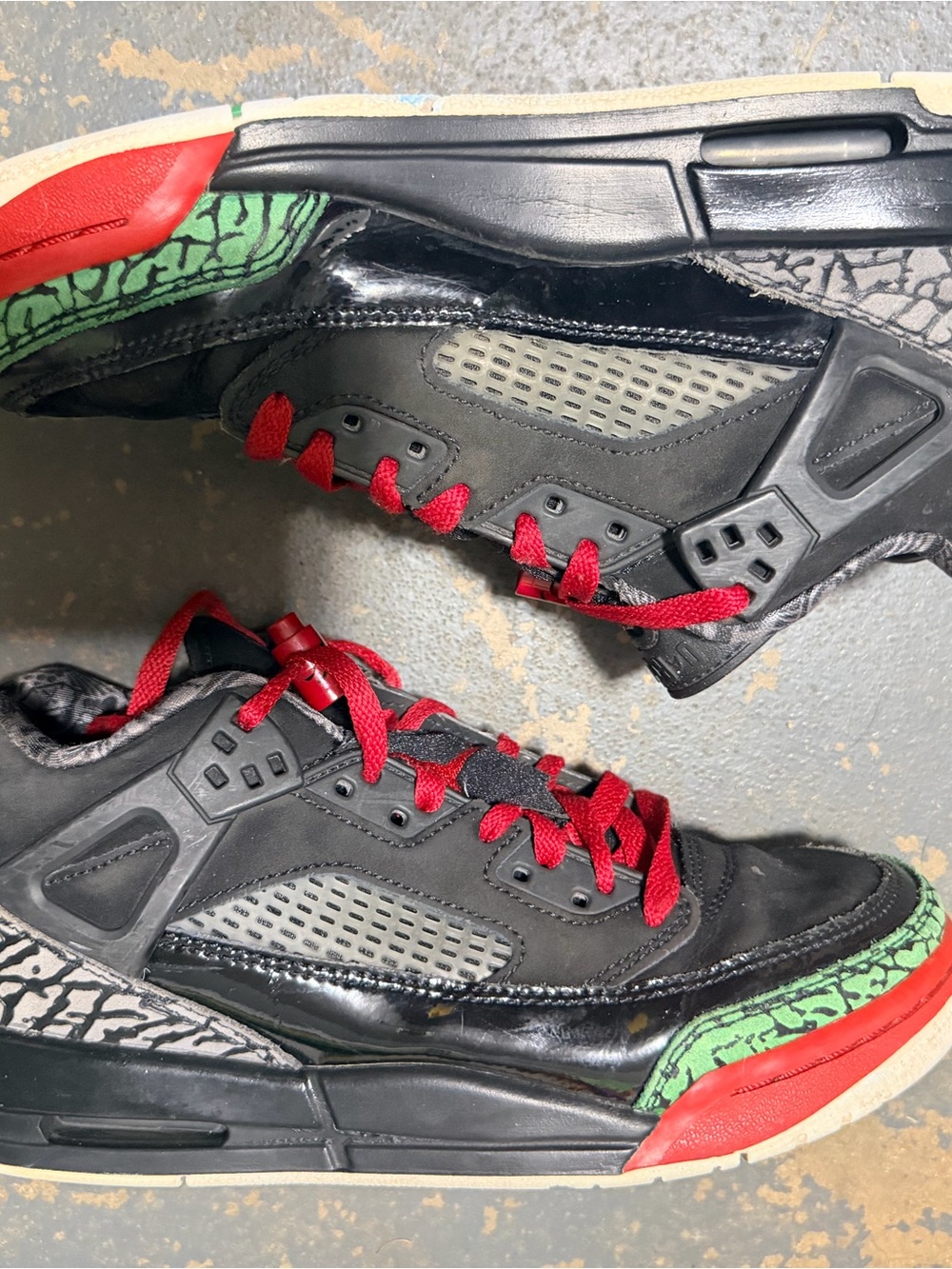 Nike Men's Black Sneakers with Red Laces and Green Accents